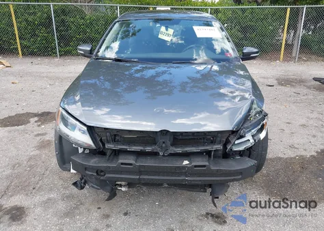 2014 Volkswagen Jetta 1.8T Sel z USA, uszkodzony, nr VIN 3VWL07AJ7EM291823